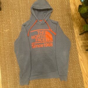 The North Face Charcoal Hoodie with Bold Orange Logo